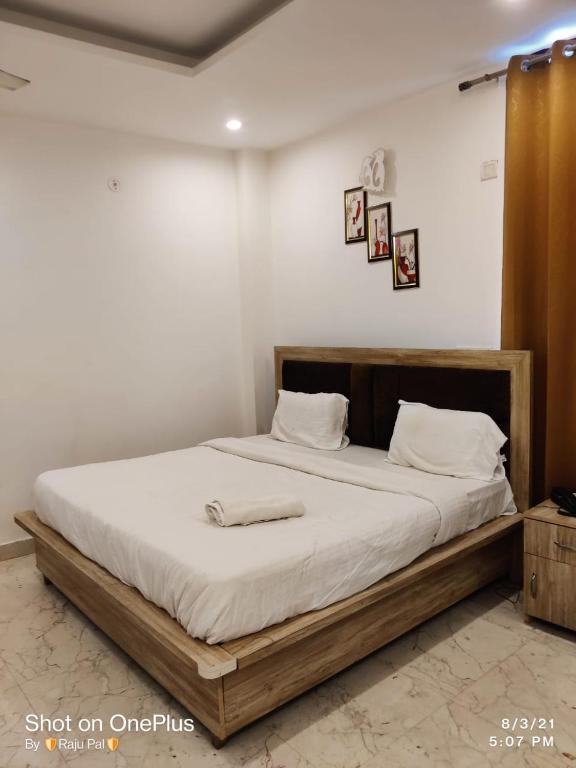 Postel nebo postele na pokoji v ubytování Hotel Rivasa Regency
