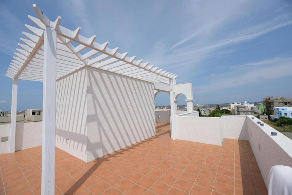 Balkón nebo terasa v ubytování Island Arch Homestay
