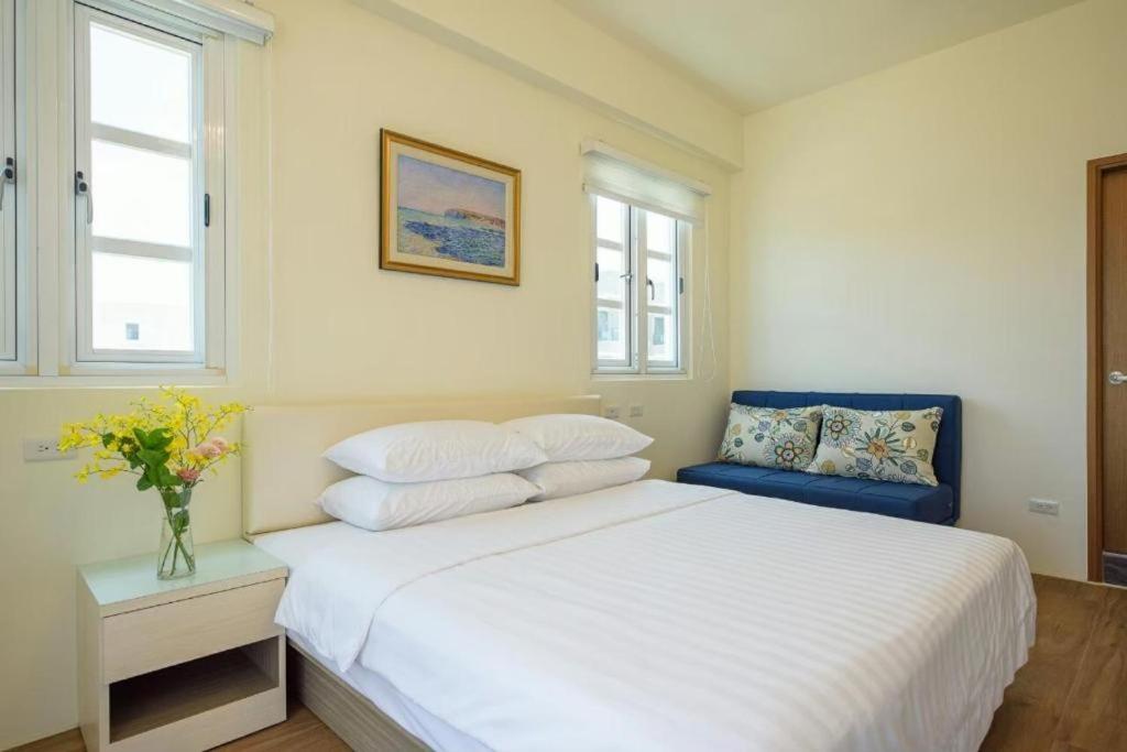 Postel nebo postele na pokoji v ubytování Island Arch Homestay