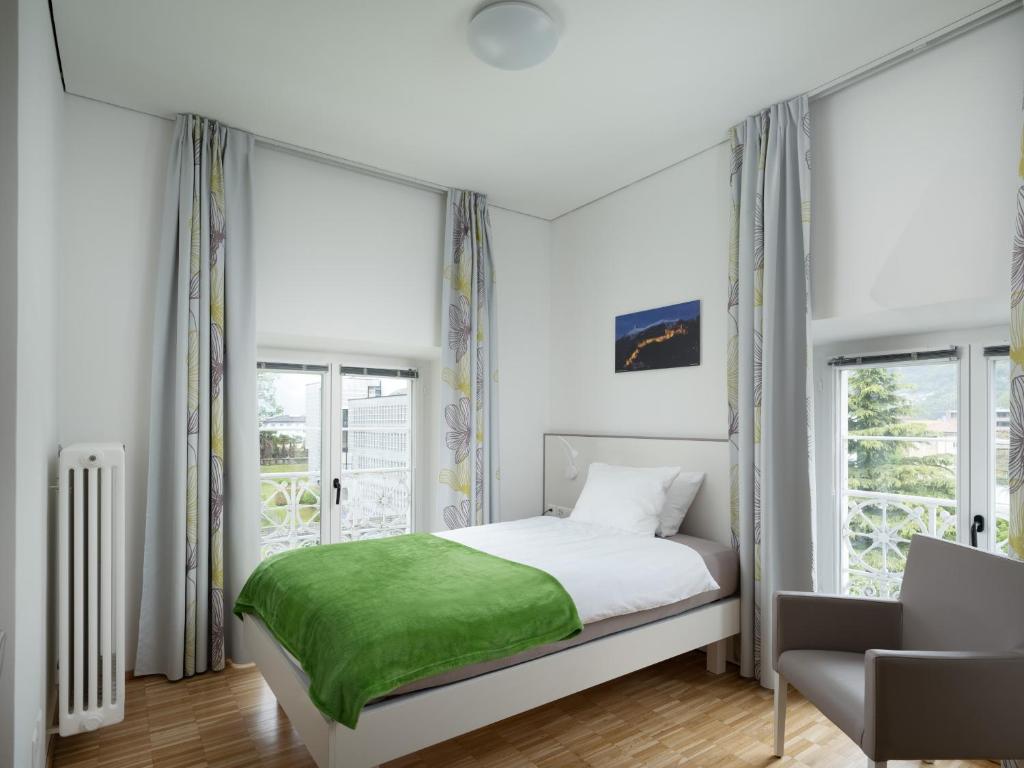 Postel nebo postele na pokoji v ubytování Business Center IN Villa