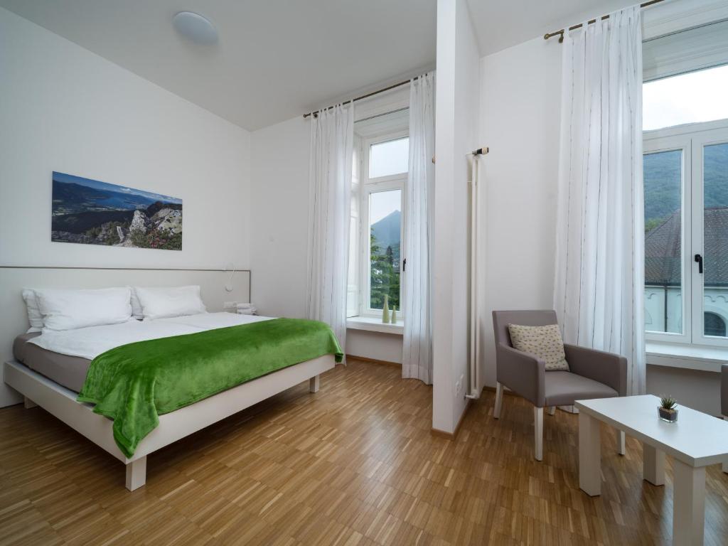 Postel nebo postele na pokoji v ubytování Business Center IN Villa