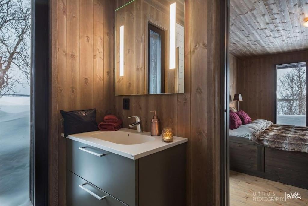 Postel nebo postele na pokoji v ubytování Nydelig og Moderne hytte på Kikut Geilo - 6 senger, 4 soverom og jacuzzi