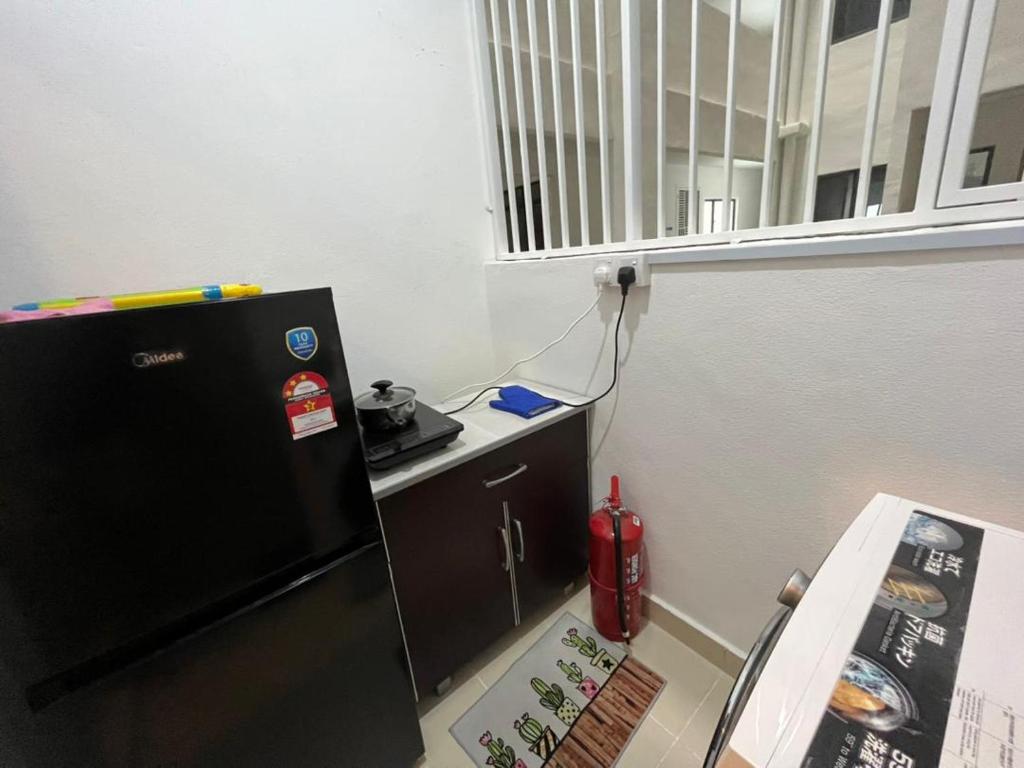 Traders Garden , cheras Trader square 3 bedroom Balakong serdang的厨房或小厨房