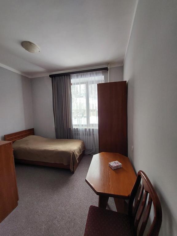Postel nebo postele na pokoji v ubytování University Hotel Tsakhkadzor