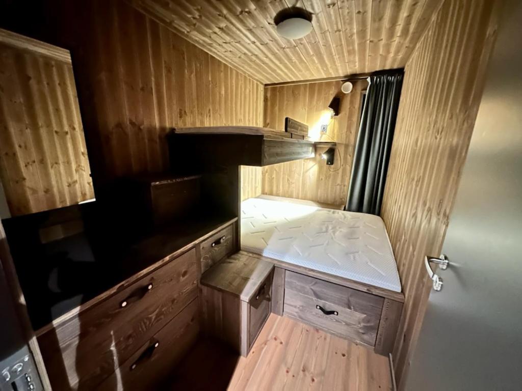 Postel nebo postele na pokoji v ubytování Nydelig og Moderne hytte på Kikut Geilo - 6 senger, 4 soverom og jacuzzi