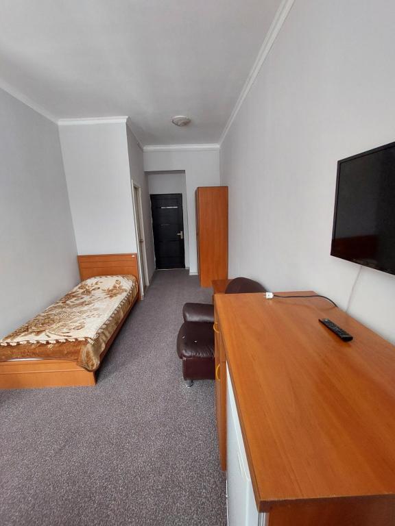 Postel nebo postele na pokoji v ubytování University Hotel Tsakhkadzor