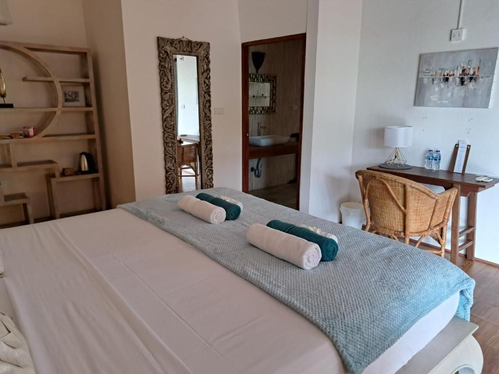 Postel nebo postele na pokoji v ubytování Laura Guest House-adult only-