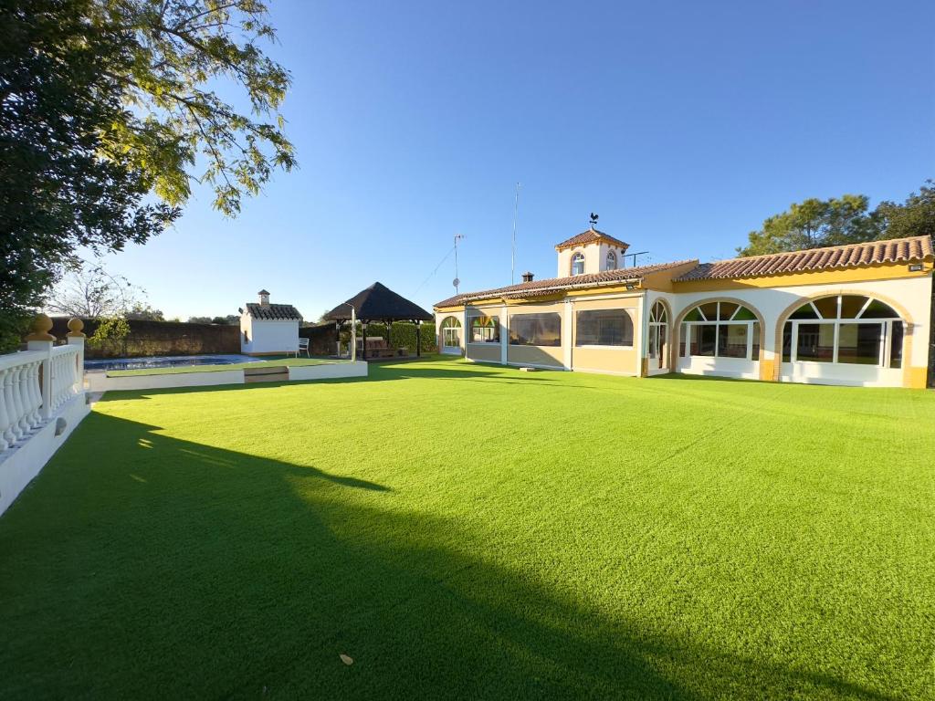 Vonkajšia záhrada v ubytovaní VILLA MACARENA