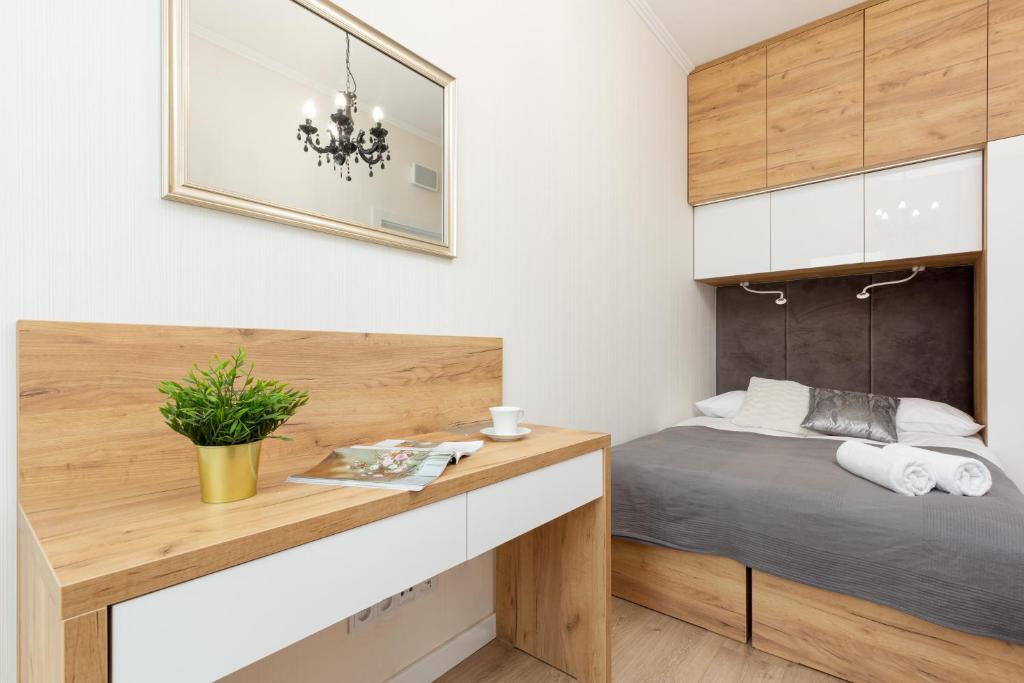 Posteľ alebo postele v izbe v ubytovaní Central Business District Warsaw Apartments by Noclegi Renters