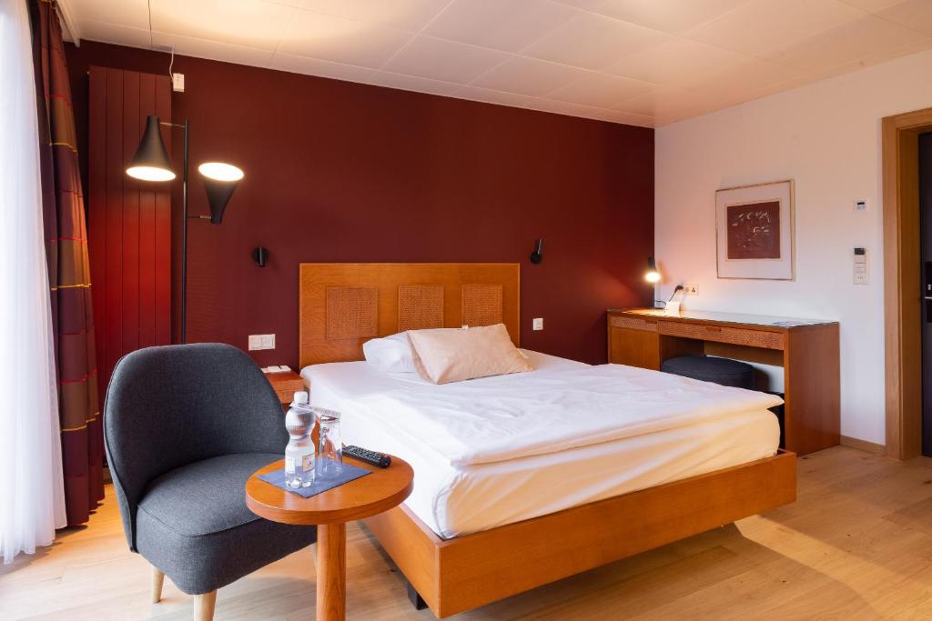 Postel nebo postele na pokoji v ubytování Engimatt City & Garden Hotel