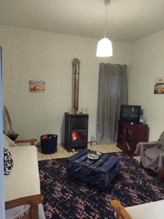 Televízia a/alebo spoločenská miestnosť v ubytovaní Nala's House