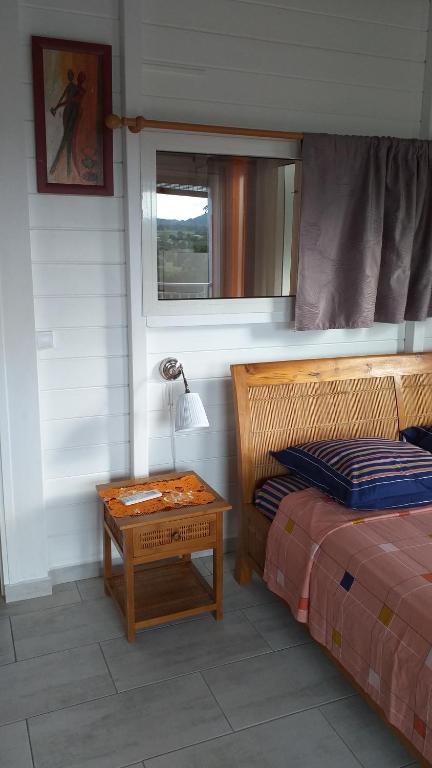 Postel nebo postele na pokoji v ubytování Nouveau logement T2 avec vue sur mer et montagne