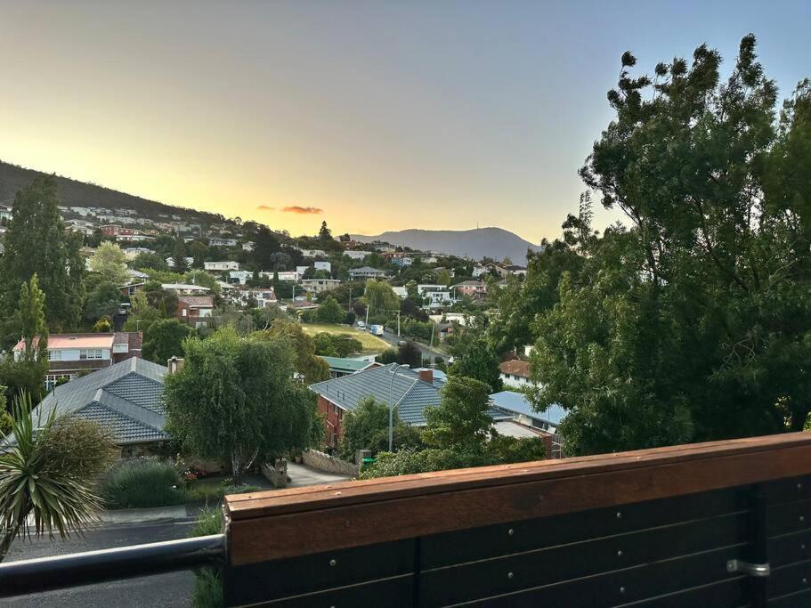 a view of a city with houses and trees at Mt Wellington Balcony House - Wake Up to the Summit in Sandy Bay