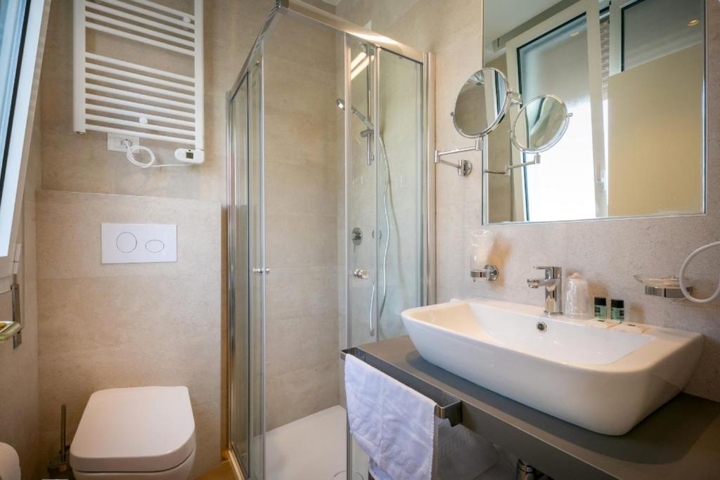 Koupelna v ubytování Hotel Le Lampare
