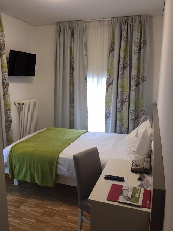 Postel nebo postele na pokoji v ubytování Business Center IN Villa