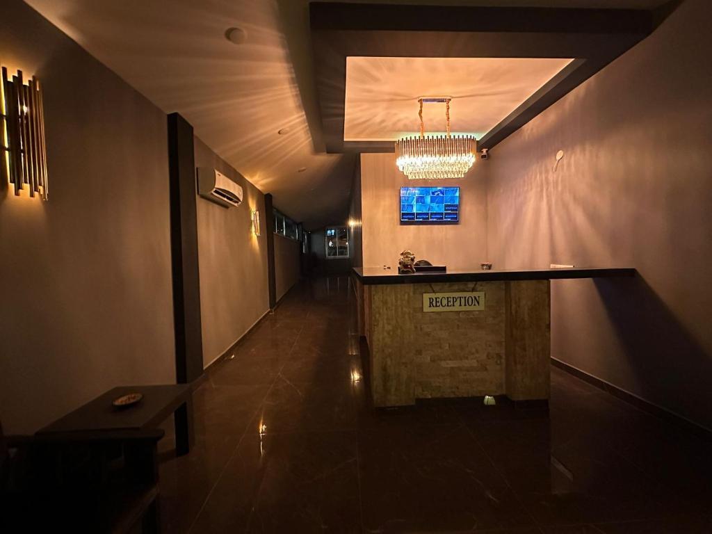 En TV eller et underholdningssystem på Alanya Central Apartments