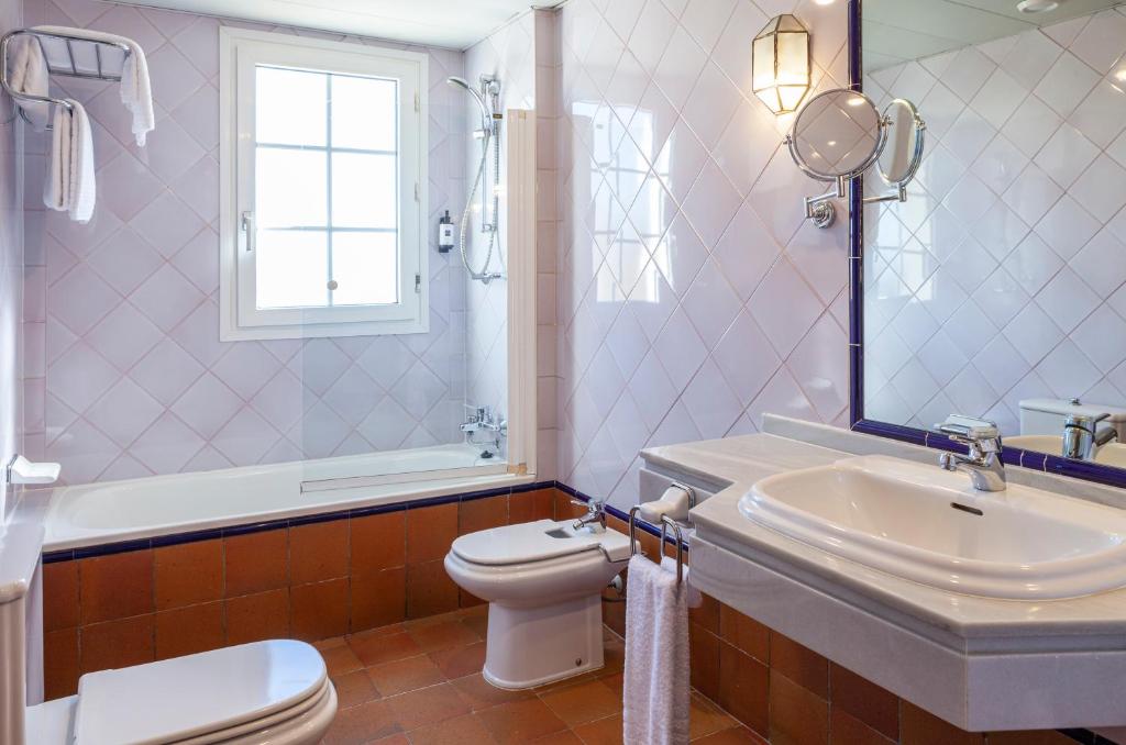 Koupelna v ubytování Hotel Macià Alfaros