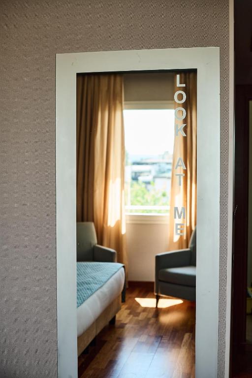 Postel nebo postele na pokoji v ubytování Hotel Da Vinci