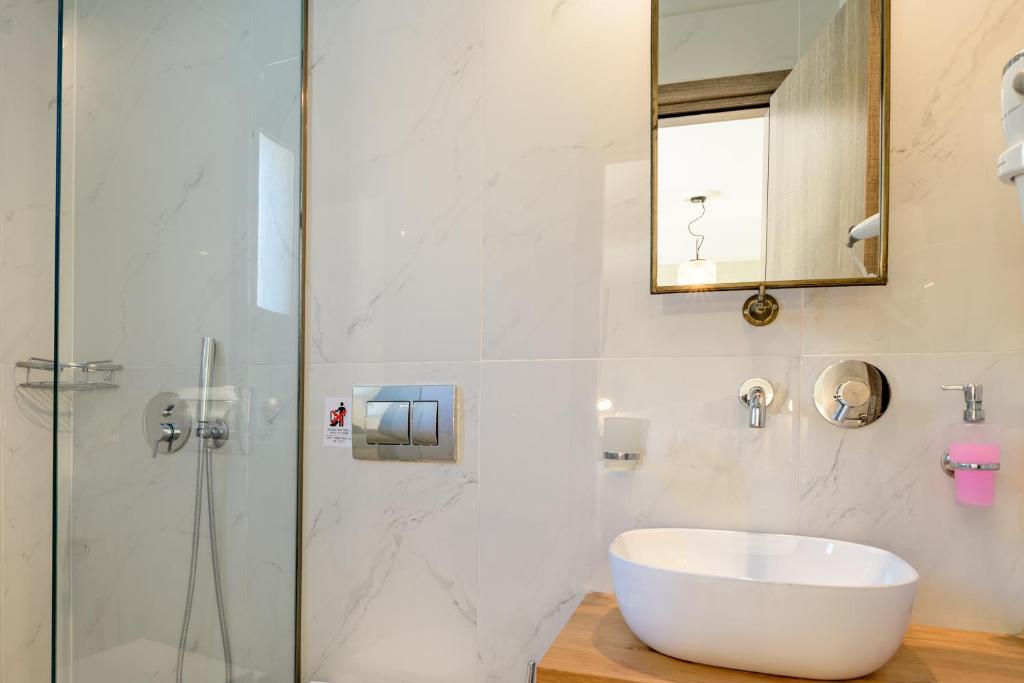 Koupelna v ubytování La Signora Hotel