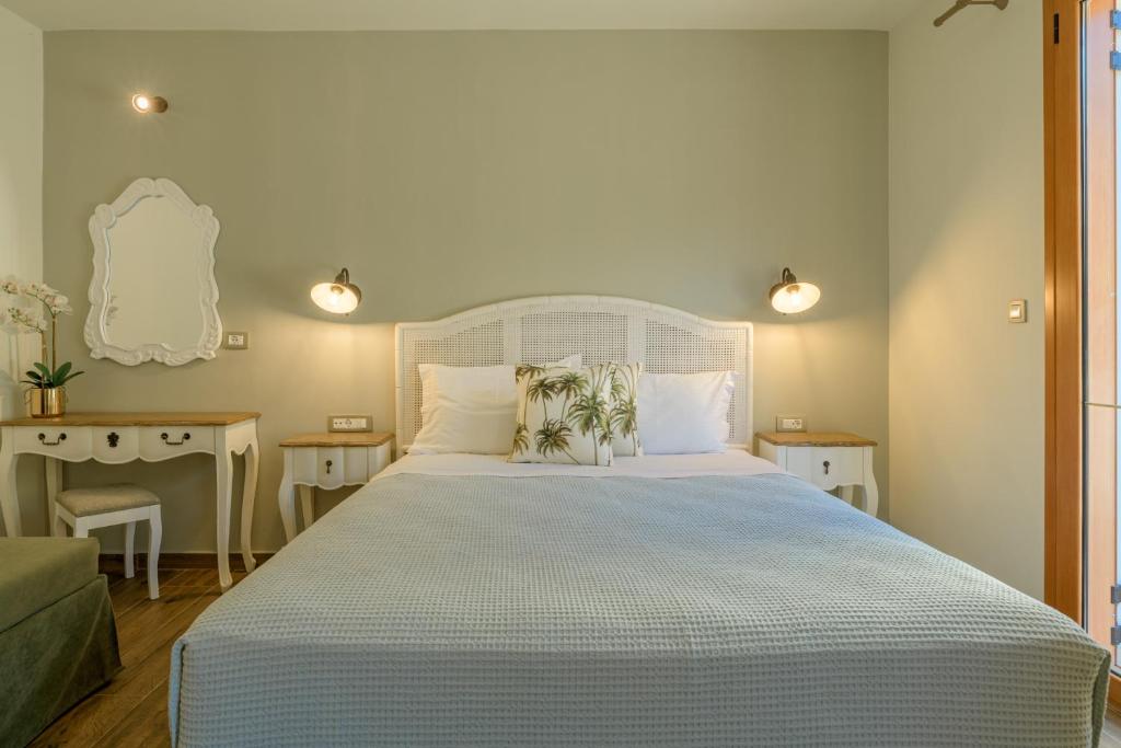 Postel nebo postele na pokoji v ubytování La Signora Hotel