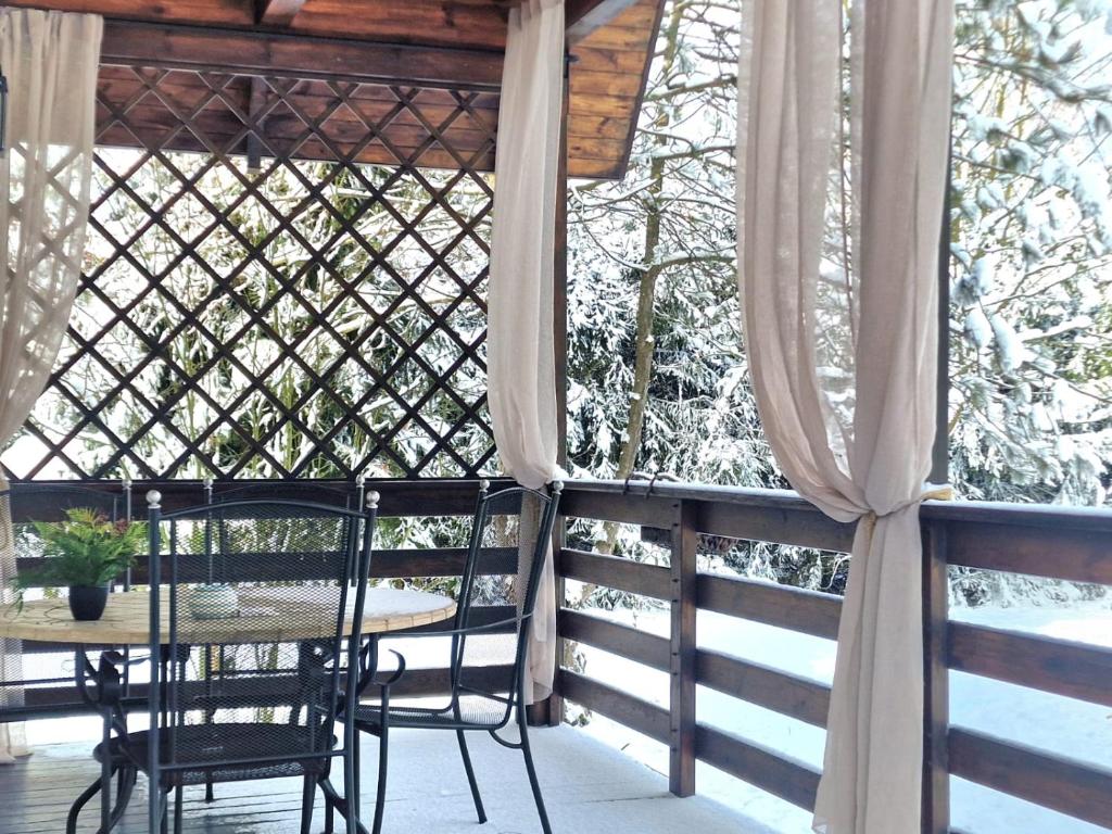 Balkón nebo terasa v ubytování LAGO BLANCO