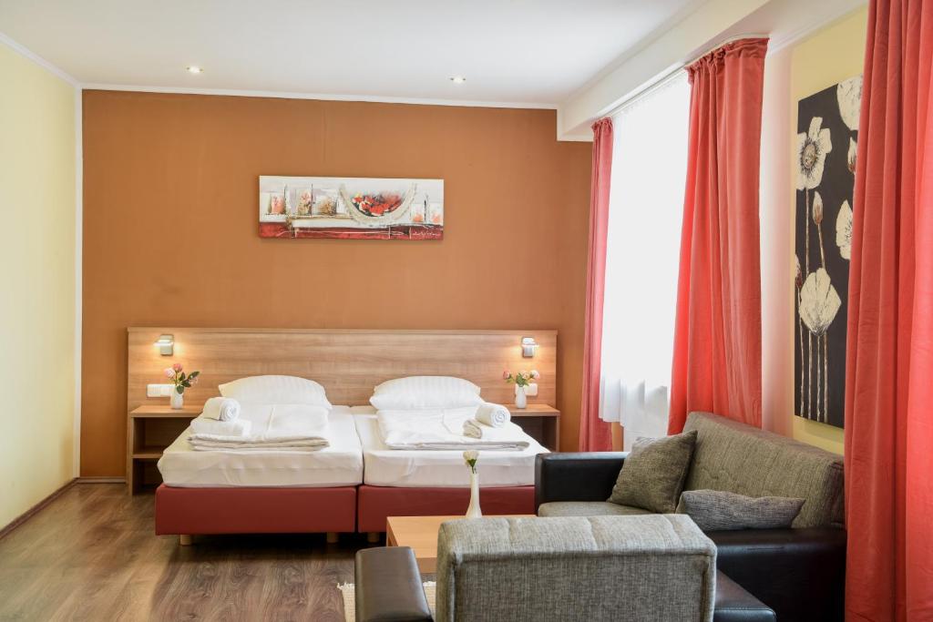 Postel nebo postele na pokoji v ubytování Hotel Heisede