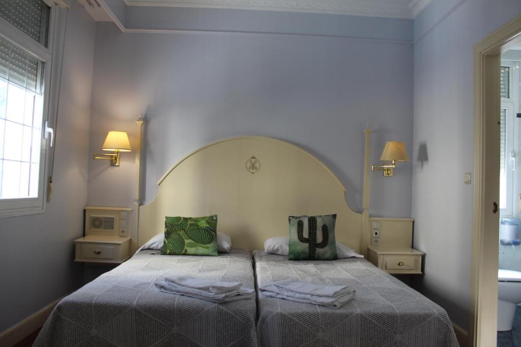 Postel nebo postele na pokoji v ubytování Hotel Harrison Etxea
