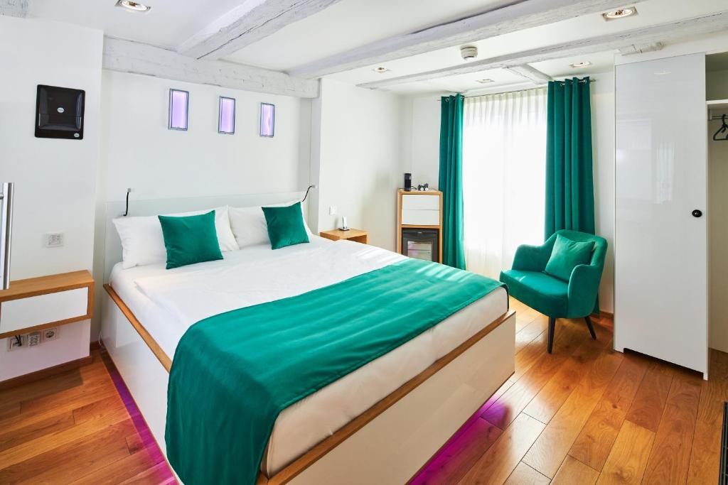 Postel nebo postele na pokoji v ubytování Hotel Max am See