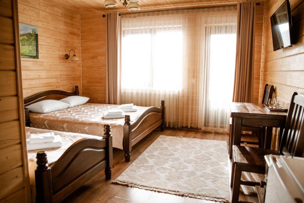 Postel nebo postele na pokoji v ubytování Continental SPA Resort