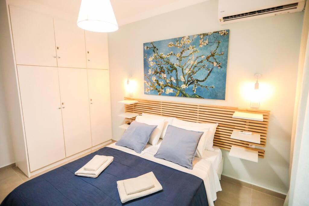 Posteľ alebo postele v izbe v ubytovaní 350m from museum of Acropolis A cozy & quiet house