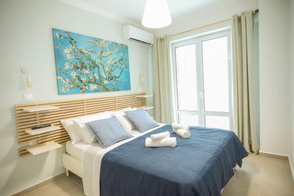 Posteľ alebo postele v izbe v ubytovaní 350m from museum of Acropolis A cozy & quiet house