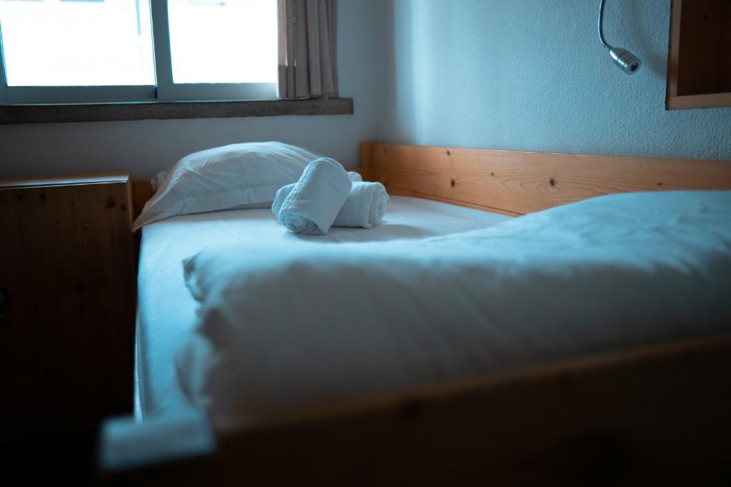 Postel nebo postele na pokoji v ubytování Wax Hostel