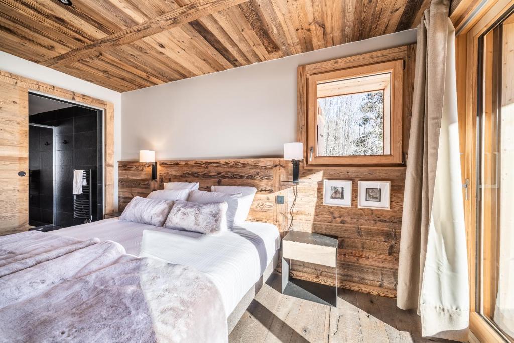 Posteľ alebo postele v izbe v ubytovaní Chalet Floquet de Neu Les Gets- BY EMERALD STAY