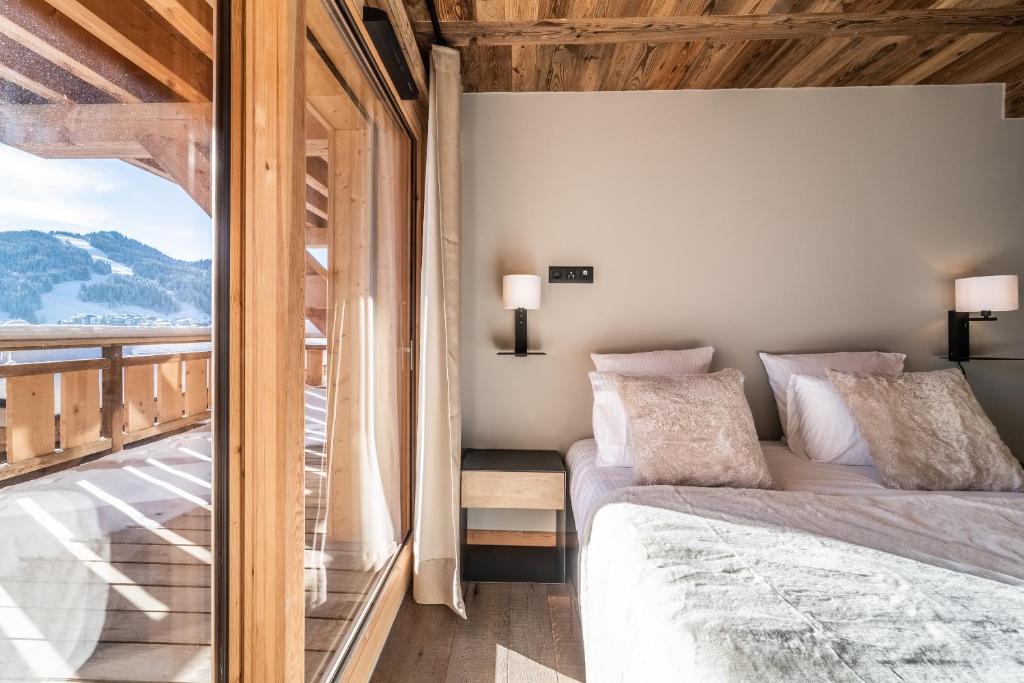 Posteľ alebo postele v izbe v ubytovaní Chalet Floquet de Neu Les Gets- BY EMERALD STAY