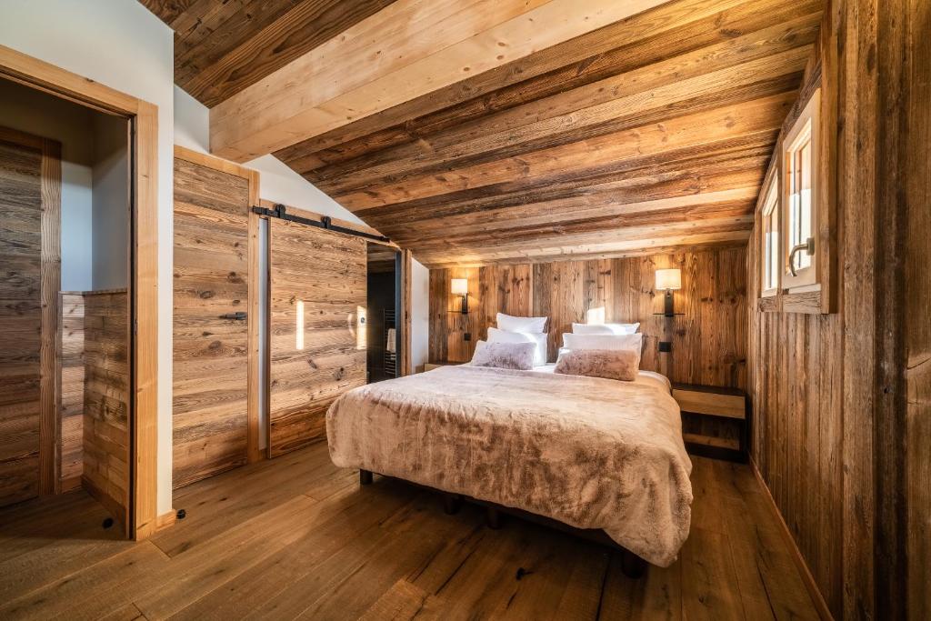 Posteľ alebo postele v izbe v ubytovaní Chalet Floquet de Neu Les Gets- BY EMERALD STAY