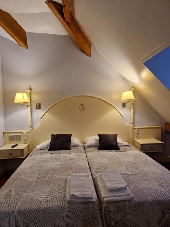 Postel nebo postele na pokoji v ubytování Hotel Harrison Etxea