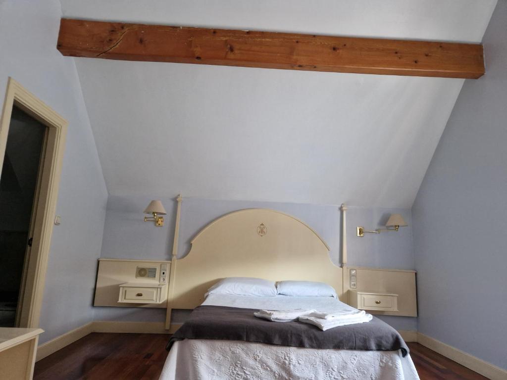 Postel nebo postele na pokoji v ubytování Hotel Harrison Etxea