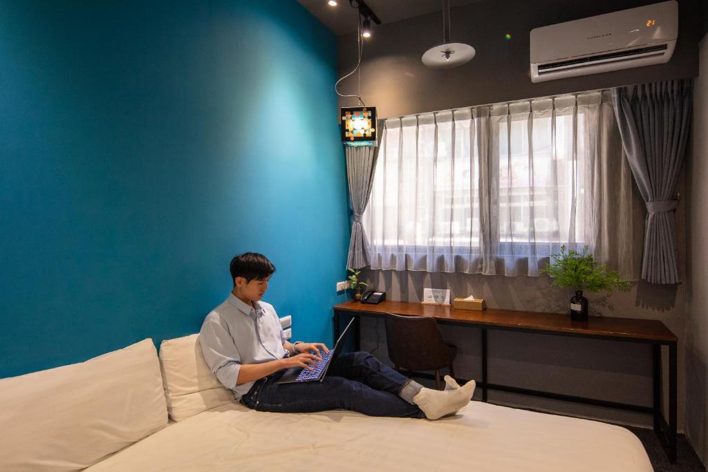 Postel nebo postele na pokoji v ubytování Cho Hotel 3