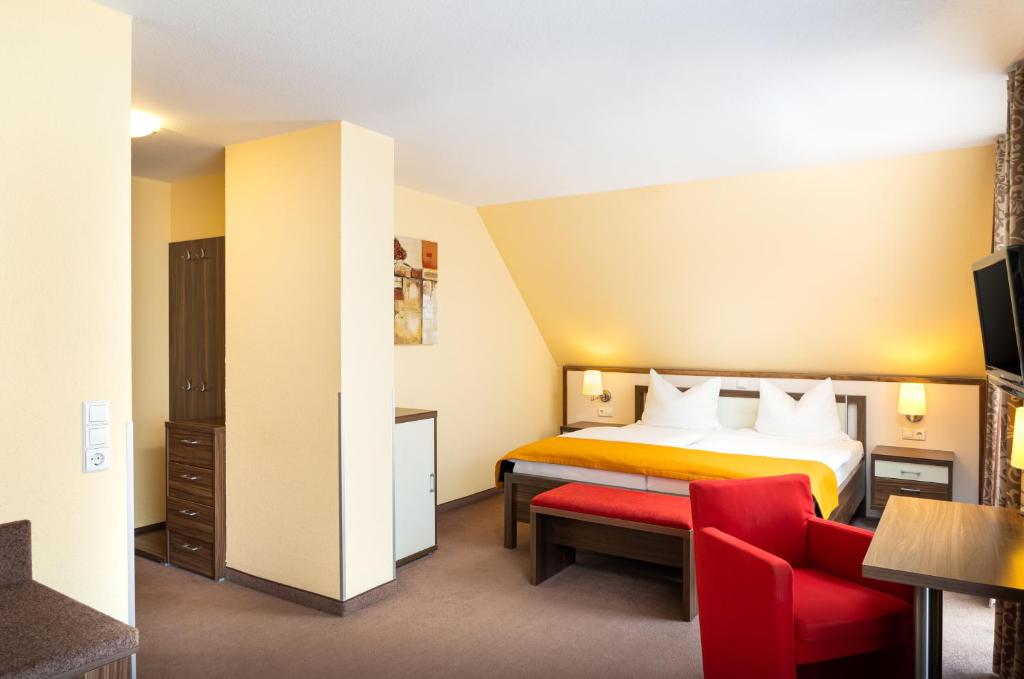 Postel nebo postele na pokoji v ubytování Hotel-Residenz Immenhof