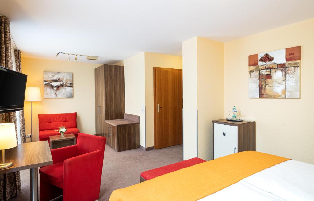 TV a/nebo společenská místnost v ubytování Hotel-Residenz Immenhof