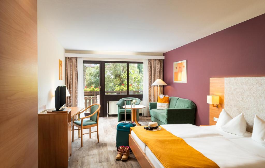 Postel nebo postele na pokoji v ubytování Hotel-Residenz Immenhof