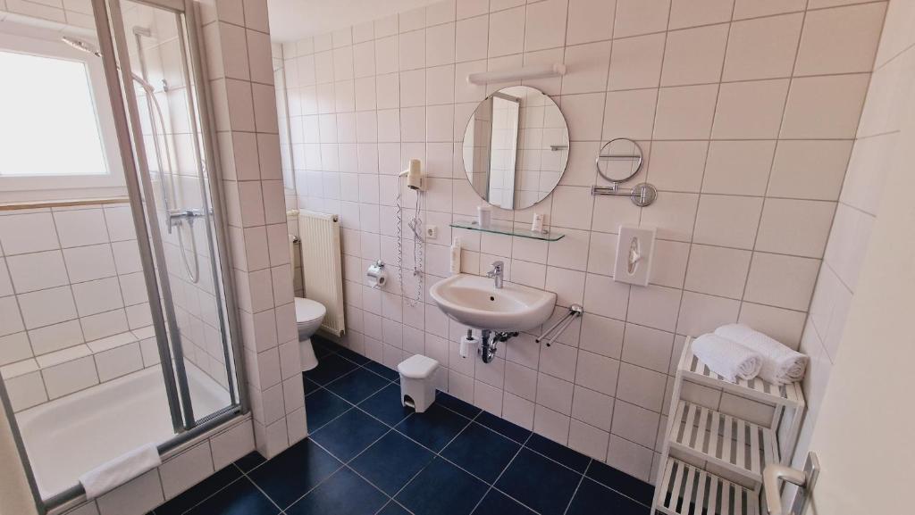 Koupelna v ubytování Hotel Garni Superior