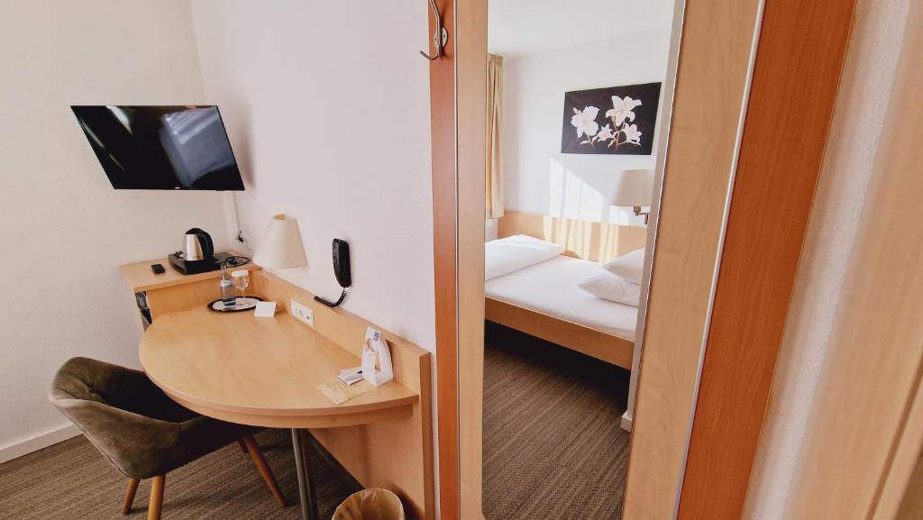 Postel nebo postele na pokoji v ubytování Hotel Garni Superior