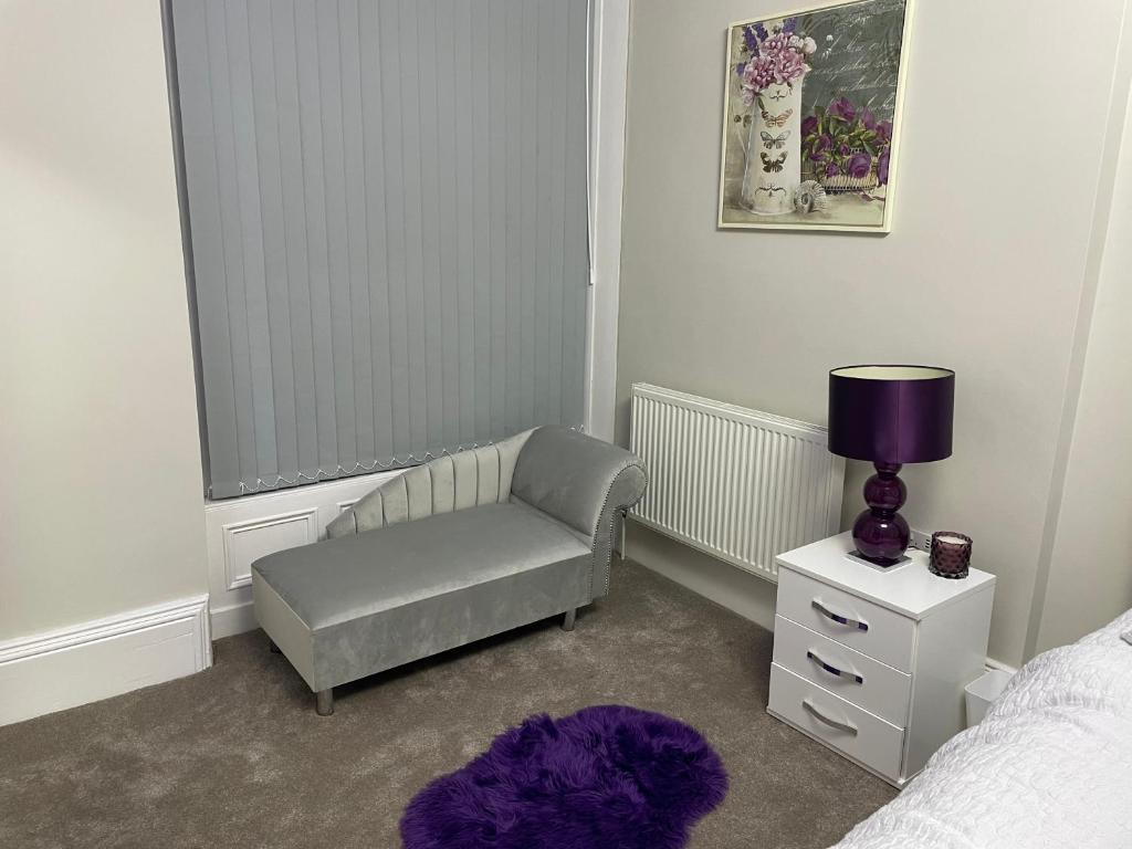 Postel nebo postele na pokoji v ubytování Imperial Suites Bradford