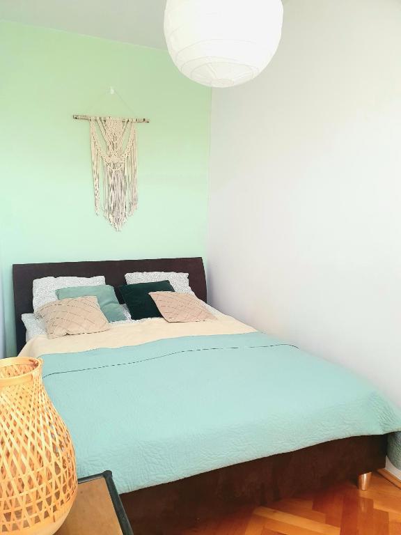 Posteľ alebo postele v izbe v ubytovaní Positive Olive Apartment