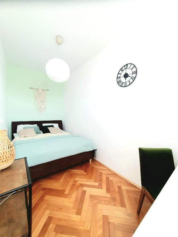 Posteľ alebo postele v izbe v ubytovaní Positive Olive Apartment