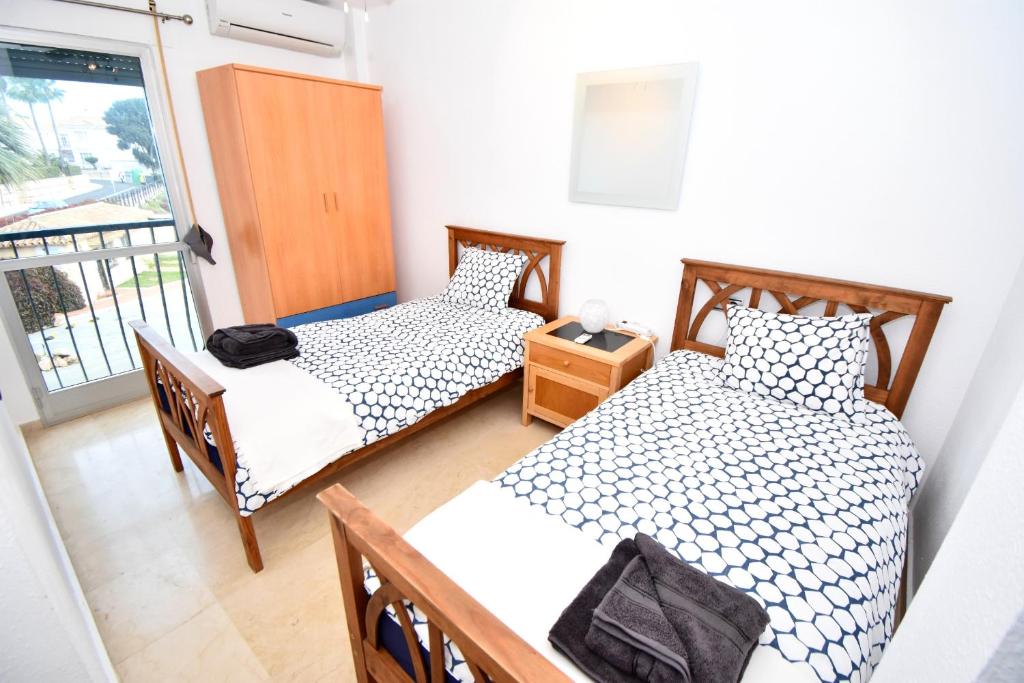 Postel nebo postele na pokoji v ubytování Wyndham Resort 4 Bed House