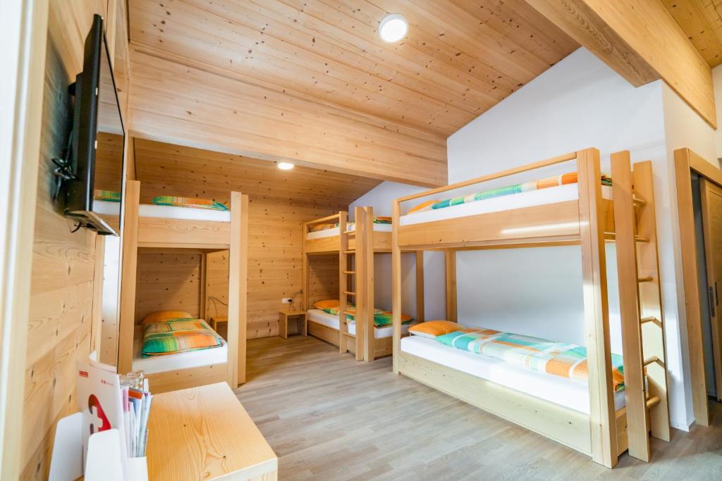Postel nebo postele na pokoji v ubytování Hotel Wasserfall