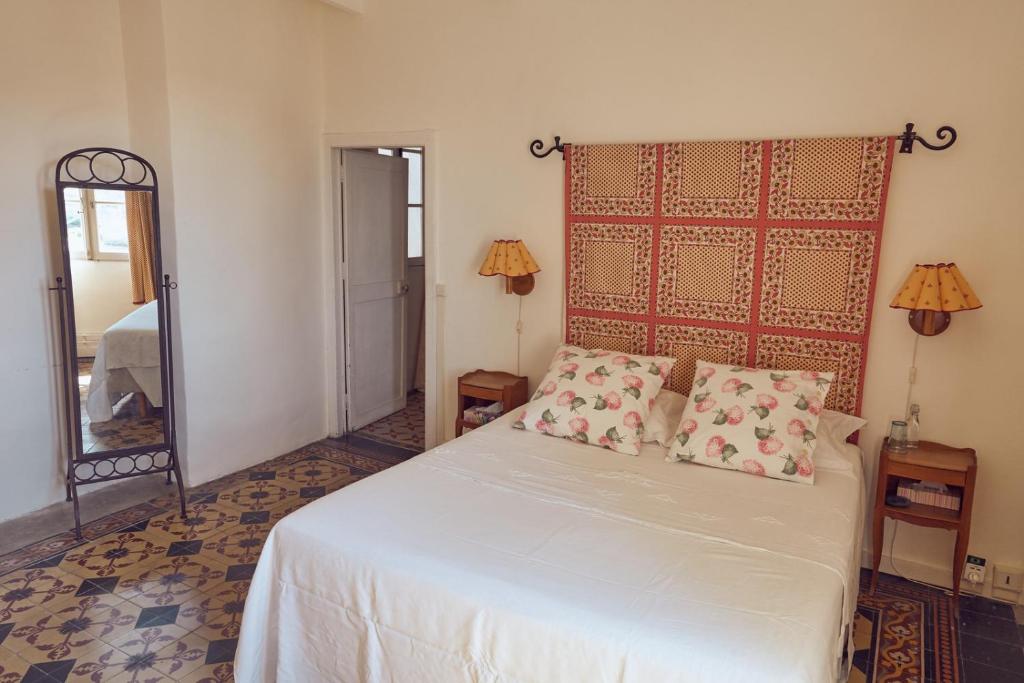 Postel nebo postele na pokoji v ubytování Hotel de L Orange