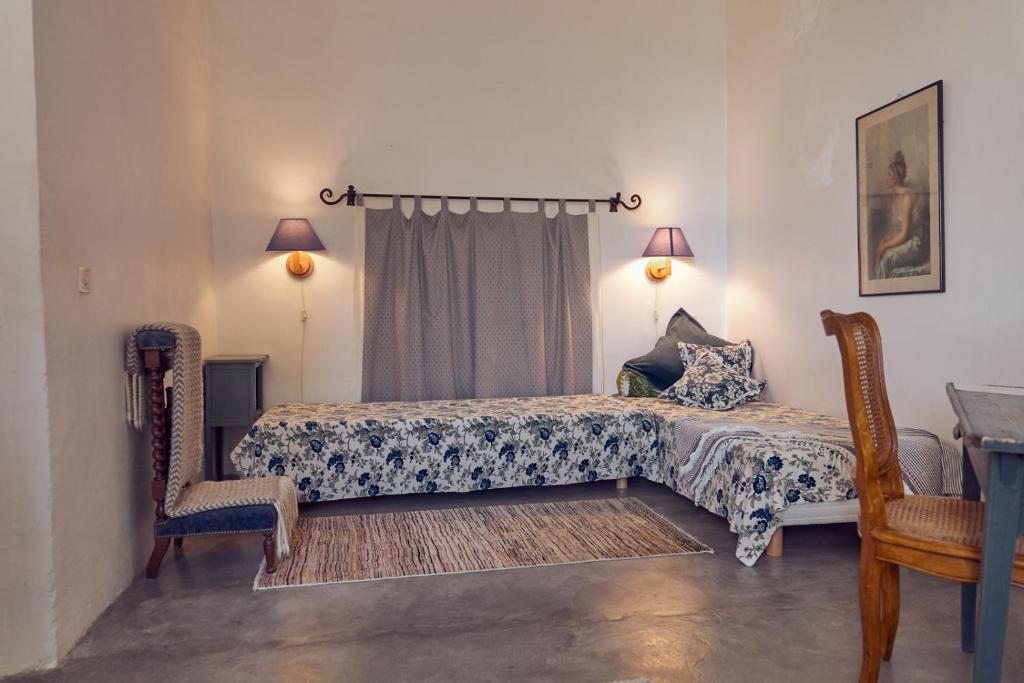 Postel nebo postele na pokoji v ubytování Hotel de L Orange